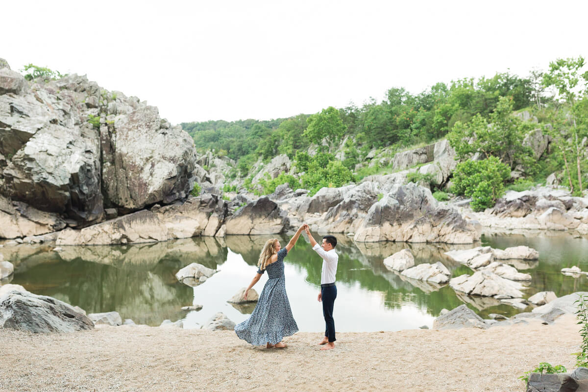 Couple dancing on private beach at Great Falls
