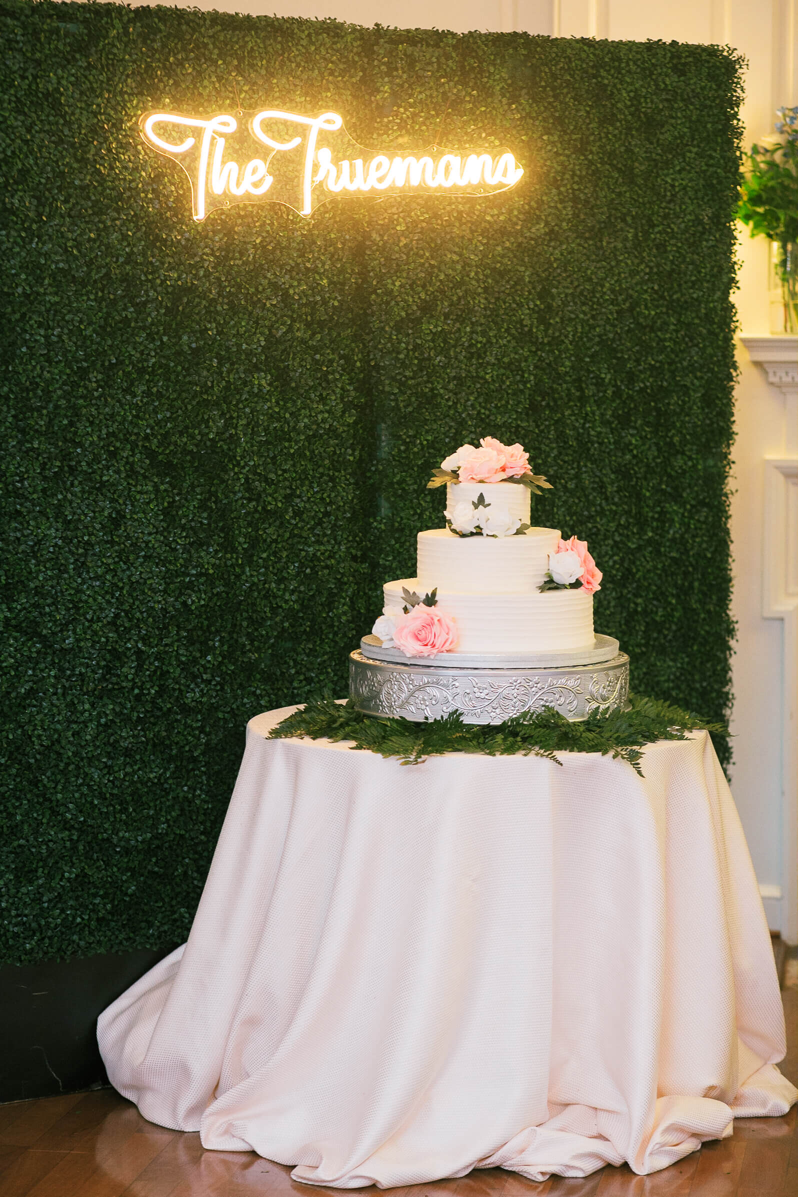 Three tiered cake and neon last name sign | Fall Wedding at River Farm in Alexandria by Virginia Photographers