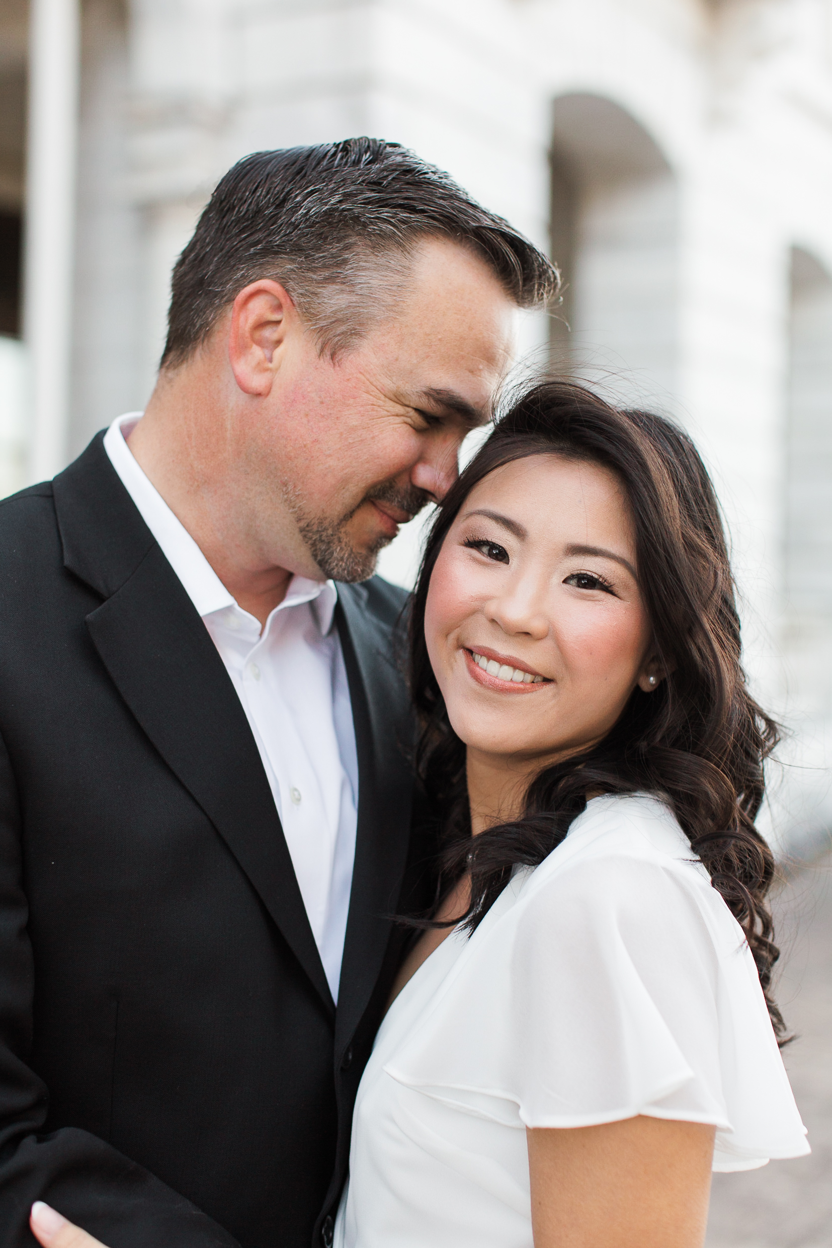 White marble palace engagement session