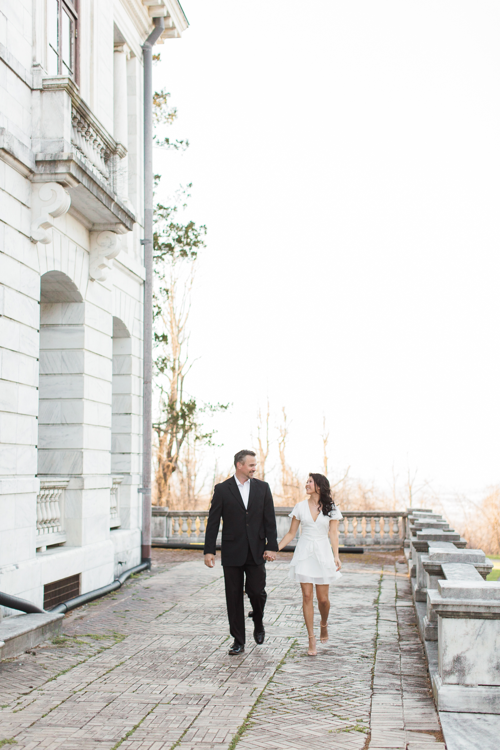 White marble palace engagement session